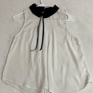 Elegant White Sleeveless Blouse with Black Collar